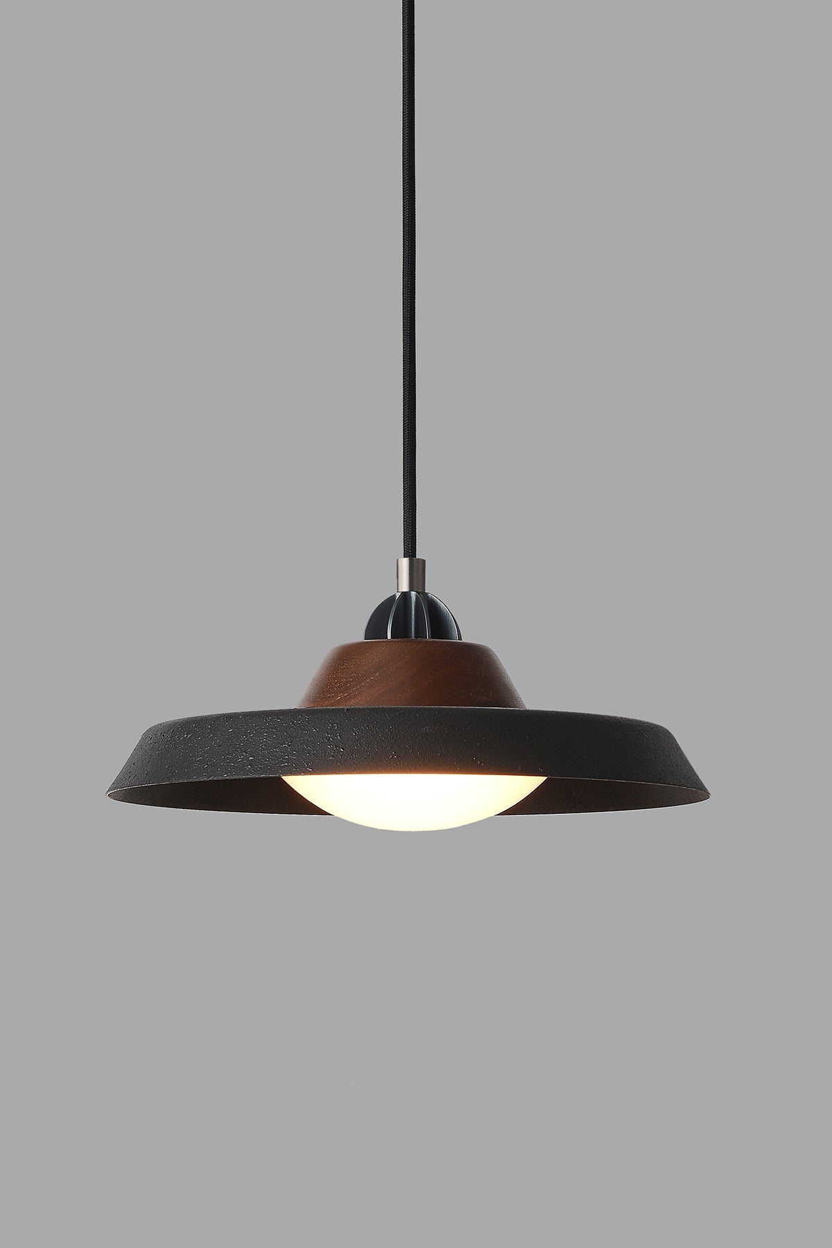 Modern industrial pendant with warm LED bulb