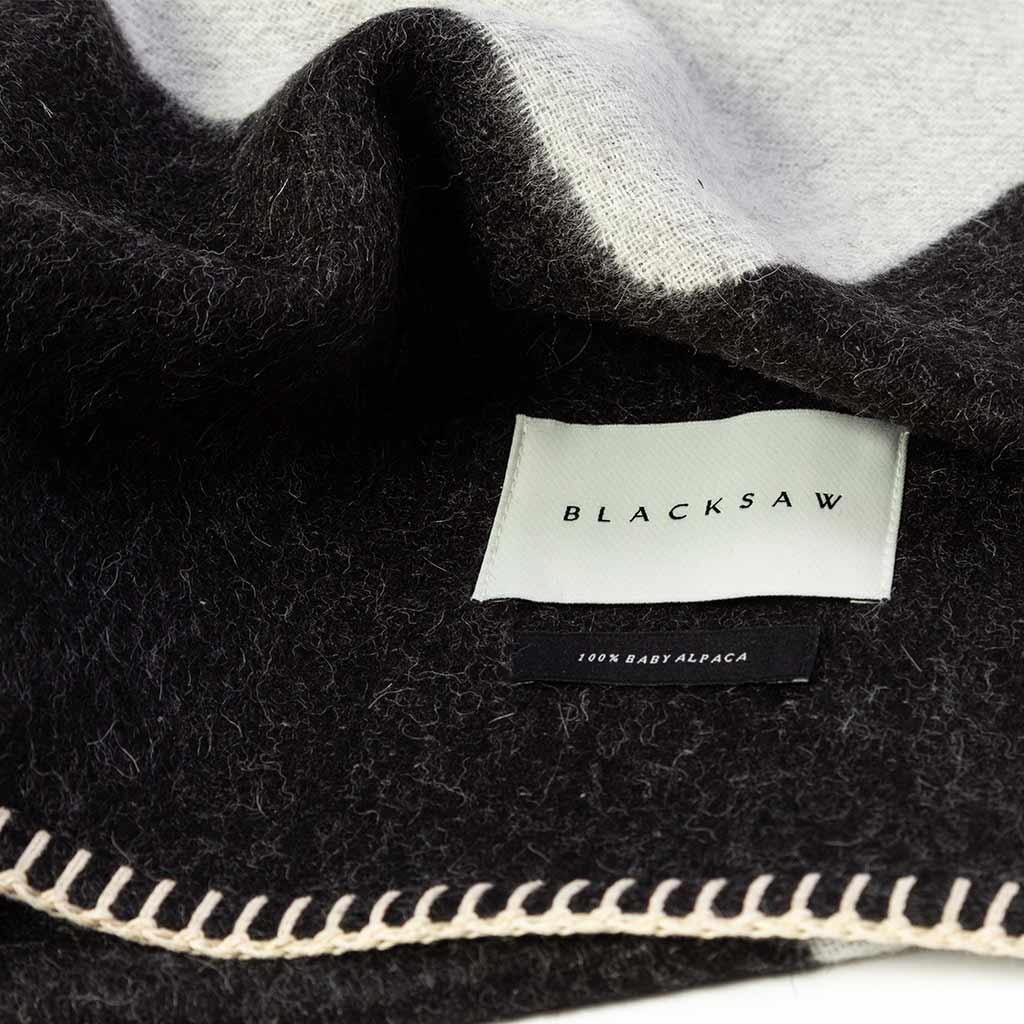 BLACKSAW TEXTILES - Generation Reversible Throw - Black/Ivory