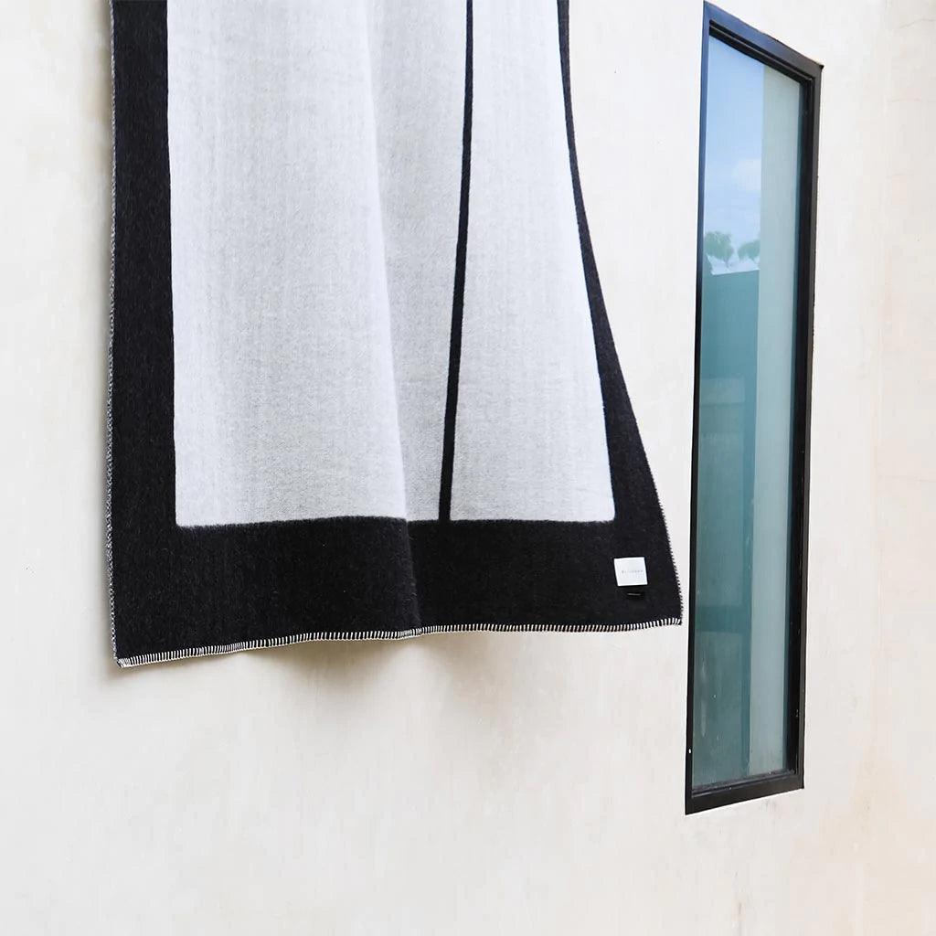 BLACKSAW TEXTILES - Generation Reversible Throw - Black/Ivory