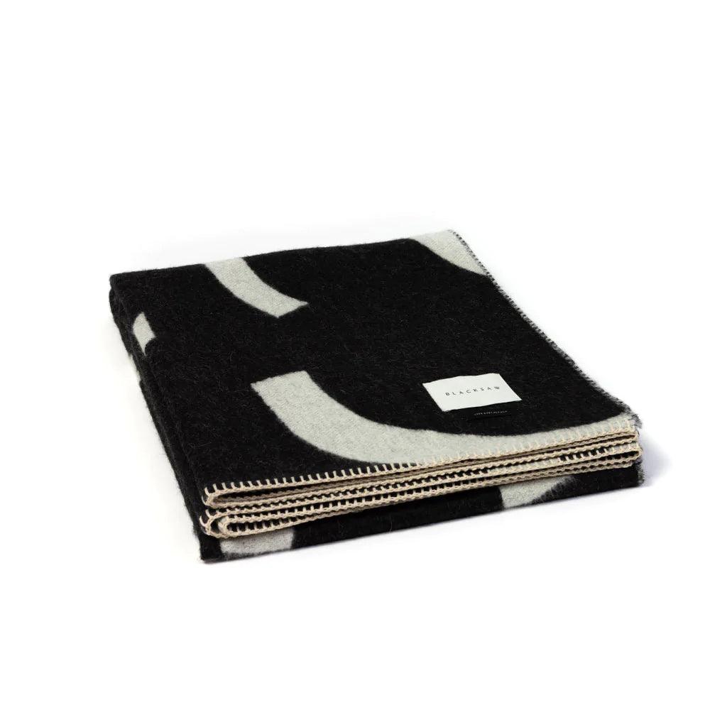 BLACKSAW TEXTILES - Visions Reversible Throw - Black/Ivory