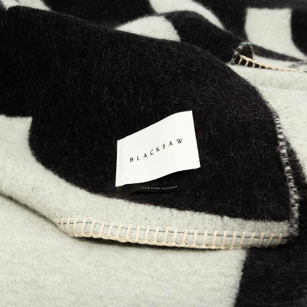 BLACKSAW TEXTILES - Visions Reversible Throw - Black/Ivory