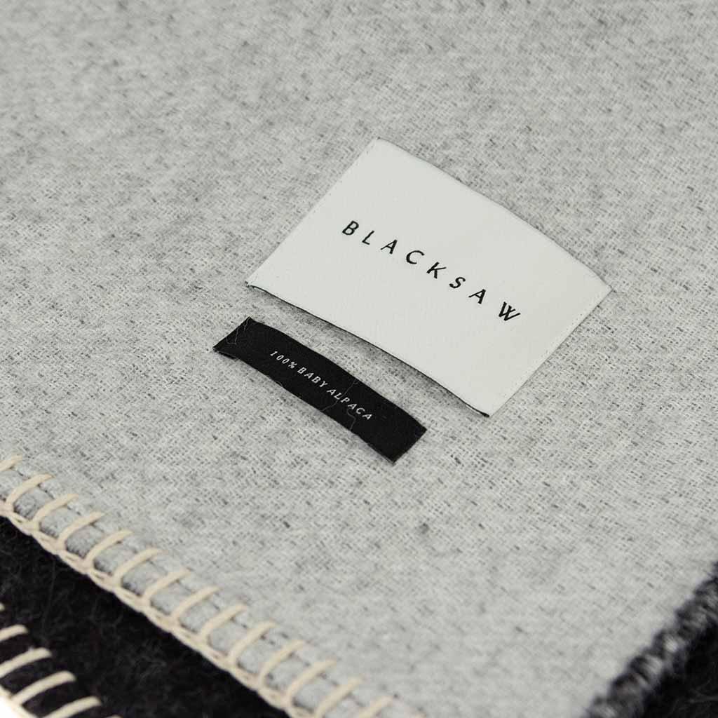 BLACKSAW TEXTILES - Yin Reversible Throw - Black/Ivory